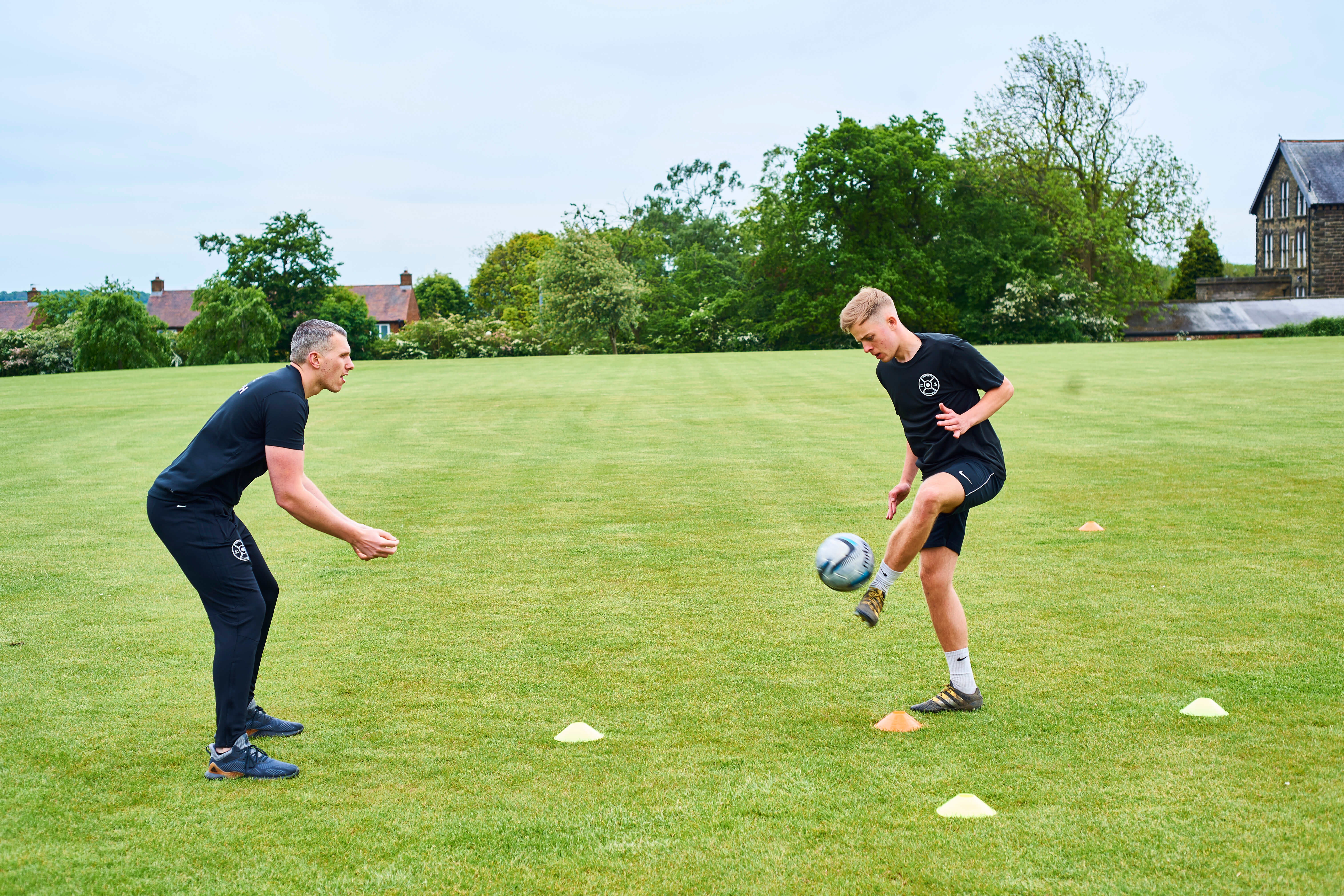 Client performing football specific conditioning during a Sports Specific Training session
